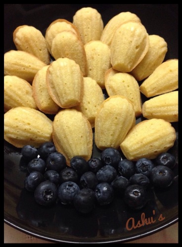 Mini Madeleines and blue berries for breakfast.